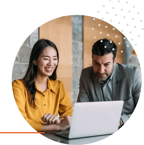 Couple sitting at laptop
