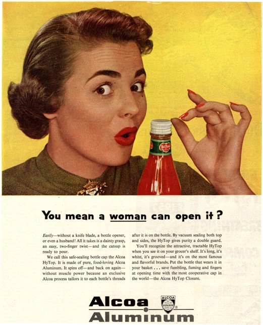 A person holding a bottle of ketchup

Description automatically generated